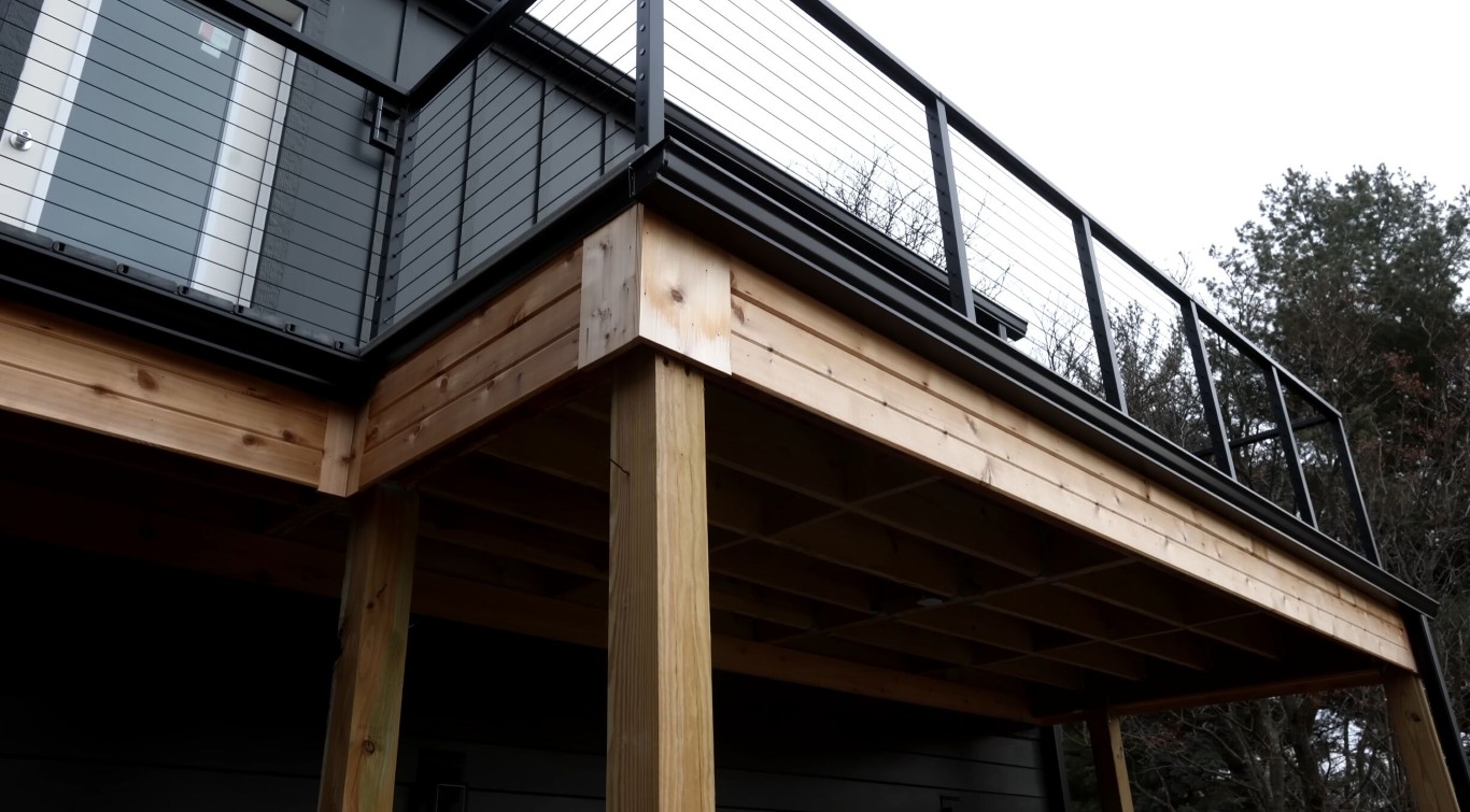 Modern deck with safety railings and stairs installation
